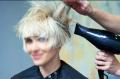 Blow drying women's short hair